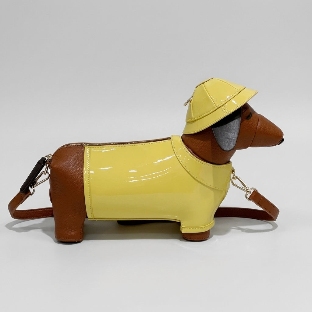 Dog-shaped purse with yellow body and brown legs on a white background
