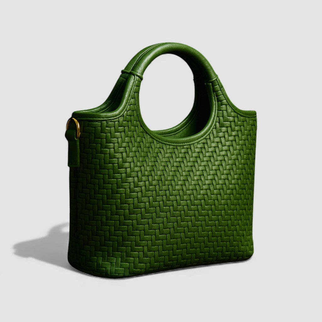 Green woven handbag on a light gray background